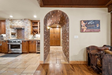 Discover elegant living paired with the charm of the southwest on Pinetop Lakes Country Club in Arizona - for sale on GolfHomes.com, golf home, golf lot
