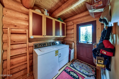 A True Log Cabin in the Woods! This beautiful log cabin has on Grand Lake Golf Course in Colorado - for sale on GolfHomes.com, golf home, golf lot