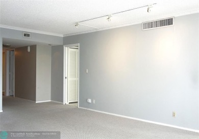 OUTSTANDING GOLF COURSE VIEWS from this 3 bedroom 2 bath bright on Palm-Aire Country Club and Resort - Palms in Florida - for sale on GolfHomes.com, golf home, golf lot