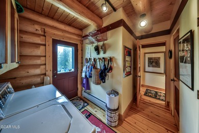 A True Log Cabin in the Woods! This beautiful log cabin has on Grand Lake Golf Course in Colorado - for sale on GolfHomes.com, golf home, golf lot