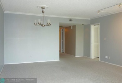 OUTSTANDING GOLF COURSE VIEWS from this 3 bedroom 2 bath bright on Palm-Aire Country Club and Resort - Palms in Florida - for sale on GolfHomes.com, golf home, golf lot