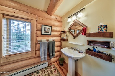 A True Log Cabin in the Woods! This beautiful log cabin has on Grand Lake Golf Course in Colorado - for sale on GolfHomes.com, golf home, golf lot