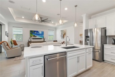 Immaculate Pulte Mystique with Exceptional Upgrades on Premier on The Concession Golf Club in Florida - for sale on GolfHomes.com, golf home, golf lot
