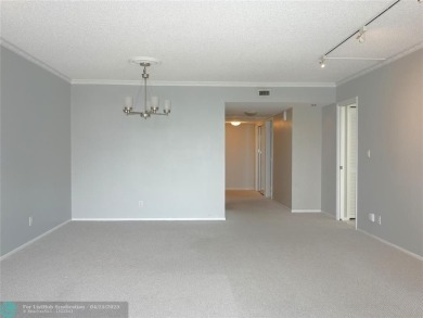 OUTSTANDING GOLF COURSE VIEWS from this 3 bedroom 2 bath bright on Palm-Aire Country Club and Resort - Palms in Florida - for sale on GolfHomes.com, golf home, golf lot