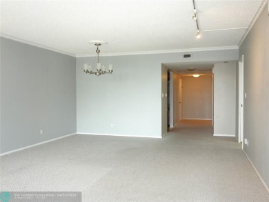 OUTSTANDING GOLF COURSE VIEWS from this 3 bedroom 2 bath bright on Palm-Aire Country Club and Resort - Palms in Florida - for sale on GolfHomes.com, golf home, golf lot