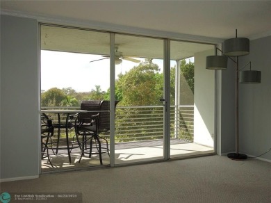 OUTSTANDING GOLF COURSE VIEWS from this 3 bedroom 2 bath bright on Palm-Aire Country Club and Resort - Palms in Florida - for sale on GolfHomes.com, golf home, golf lot