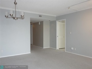 OUTSTANDING GOLF COURSE VIEWS from this 3 bedroom 2 bath bright on Palm-Aire Country Club and Resort - Palms in Florida - for sale on GolfHomes.com, golf home, golf lot