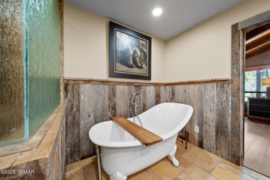 Discover elegant living paired with the charm of the southwest on Pinetop Lakes Country Club in Arizona - for sale on GolfHomes.com, golf home, golf lot