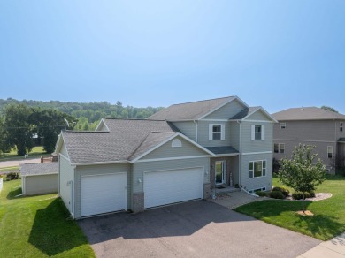 Spacious and versatile near Devil's Lake State Park. This on Baraboo Country Club in Wisconsin - for sale on GolfHomes.com, golf home, golf lot