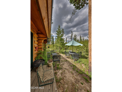 A True Log Cabin in the Woods! This beautiful log cabin has on Grand Lake Golf Course in Colorado - for sale on GolfHomes.com, golf home, golf lot