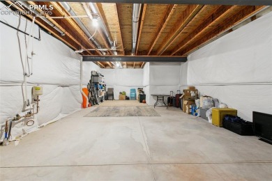 HUGE ranch plan, just TWO YEARS OLD! Backing to OPEN SPACE with on Antler Creek Golf Course in Colorado - for sale on GolfHomes.com, golf home, golf lot