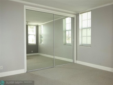 OUTSTANDING GOLF COURSE VIEWS from this 3 bedroom 2 bath bright on Palm-Aire Country Club and Resort - Palms in Florida - for sale on GolfHomes.com, golf home, golf lot