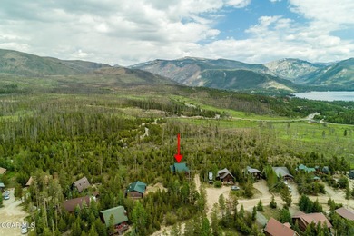 A True Log Cabin in the Woods! This beautiful log cabin has on Grand Lake Golf Course in Colorado - for sale on GolfHomes.com, golf home, golf lot