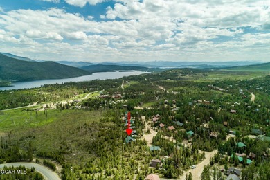 A True Log Cabin in the Woods! This beautiful log cabin has on Grand Lake Golf Course in Colorado - for sale on GolfHomes.com, golf home, golf lot