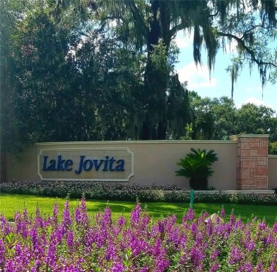 BRAND NEW ROOF  NEW Spectacular Screened Lanai add to the on Lake Jovita Golf and Country Club in Florida - for sale on GolfHomes.com, golf home, golf lot