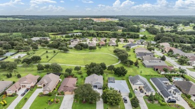 BRAND NEW ROOF  NEW Spectacular Screened Lanai add to the on Lake Jovita Golf and Country Club in Florida - for sale on GolfHomes.com, golf home, golf lot