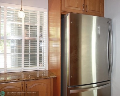 OUTSTANDING GOLF COURSE VIEWS from this 3 bedroom 2 bath bright on Palm-Aire Country Club and Resort - Palms in Florida - for sale on GolfHomes.com, golf home, golf lot