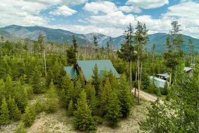 A True Log Cabin in the Woods! This beautiful log cabin has on Grand Lake Golf Course in Colorado - for sale on GolfHomes.com, golf home, golf lot