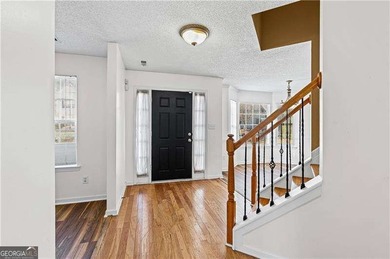 Welcome to this beautifully 4-bedroom, 2.5-bath home offering 1 on Sugar Creek Golf Course in Georgia - for sale on GolfHomes.com, golf home, golf lot