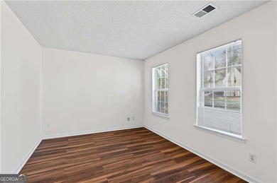 Welcome to this beautifully 4-bedroom, 2.5-bath home offering 1 on Sugar Creek Golf Course in Georgia - for sale on GolfHomes.com, golf home, golf lot