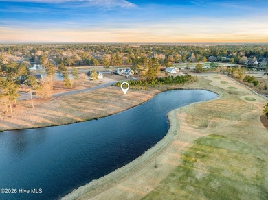 Beautiful 0.36-acre pond-front homesite located in a desirable on River Landing Golf Course in North Carolina - for sale on GolfHomes.com, golf home, golf lot