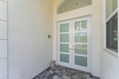Beautiful courtyard home with guest house. Recently renovated on Frenchmans Reserve in Florida - for sale on GolfHomes.com, golf home, golf lot