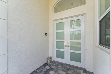 Beautiful courtyard home with guest house. Recently renovated on Frenchmans Reserve in Florida - for sale on GolfHomes.com, golf home, golf lot