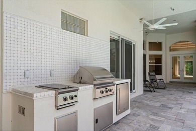 Beautiful courtyard home with guest house. Recently renovated on Frenchmans Reserve in Florida - for sale on GolfHomes.com, golf home, golf lot