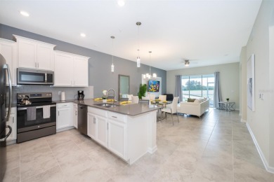 Champions Gate Condo! This beautiful Golf Course View unit is a on ChampionsGate Golf Resort in Florida - for sale on GolfHomes.com, golf home, golf lot
