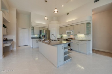This beautifully maintained 4-bedroom, 3-bathroom pool home on on The Club At Pelican Bay - North Course in Florida - for sale on GolfHomes.com, golf home, golf lot