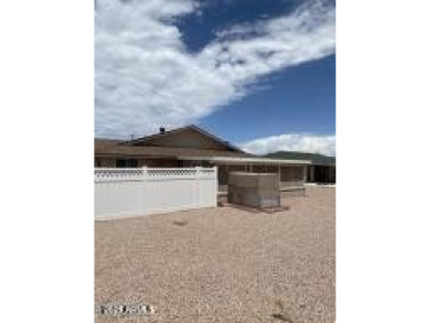 You don't want to miss this perfect location. Entertainment on Sun City Lakes West and East in Arizona - for sale on GolfHomes.com, golf home, golf lot