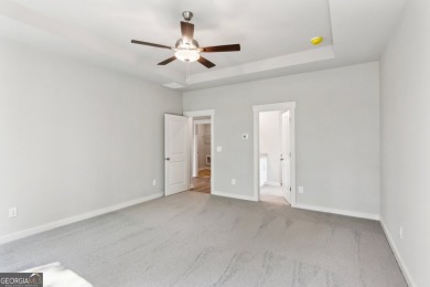 Welcome to 4306 Links Blvd, a charming ranch-style home with a on Traditions of Braselton Golf Club in Georgia - for sale on GolfHomes.com, golf home, golf lot
