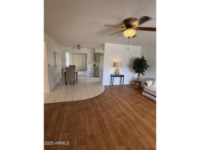You don't want to miss this perfect location. Entertainment on Sun City Lakes West and East in Arizona - for sale on GolfHomes.com, golf home, golf lot