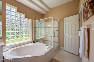 This beautifully maintained 4-bedroom, 3-bathroom pool home on on The Club At Pelican Bay - North Course in Florida - for sale on GolfHomes.com, golf home, golf lot