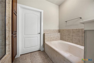 Beautiful home backing to the 17th fairway of Ram Rock Course on Apple Rock Golf Course - Horseshoe Bay in Texas - for sale on GolfHomes.com, golf home, golf lot