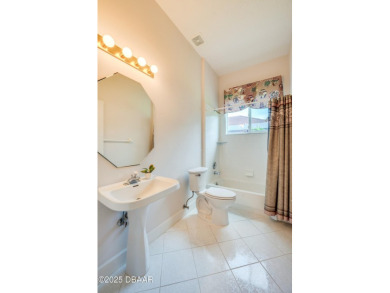 This beautifully maintained 4-bedroom, 3-bathroom pool home on on The Club At Pelican Bay - North Course in Florida - for sale on GolfHomes.com, golf home, golf lot