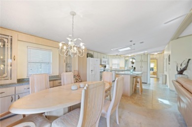 Enjoy the best of Florida living in this turnkey furnished home on Maple Leaf Golf and Country Club in Florida - for sale on GolfHomes.com, golf home, golf lot