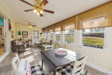 Discover this charming off water Lake Gaston home nestled along on Tanglewood Shores Golf and Country Club in Virginia - for sale on GolfHomes.com, golf home, golf lot