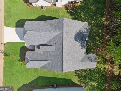 Welcome to 4306 Links Blvd, a charming ranch-style home with a on Traditions of Braselton Golf Club in Georgia - for sale on GolfHomes.com, golf home, golf lot