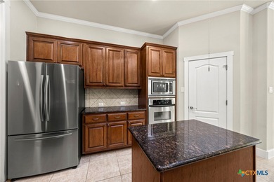 Beautiful home backing to the 17th fairway of Ram Rock Course on Apple Rock Golf Course - Horseshoe Bay in Texas - for sale on GolfHomes.com, golf home, golf lot