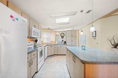 Enjoy the best of Florida living in this turnkey furnished home on Maple Leaf Golf and Country Club in Florida - for sale on GolfHomes.com, golf home, golf lot