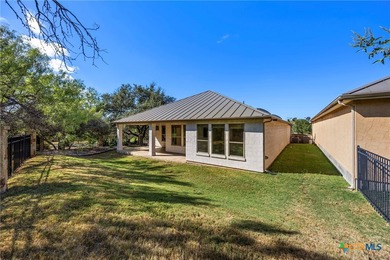 Beautiful home backing to the 17th fairway of Ram Rock Course on Apple Rock Golf Course - Horseshoe Bay in Texas - for sale on GolfHomes.com, golf home, golf lot