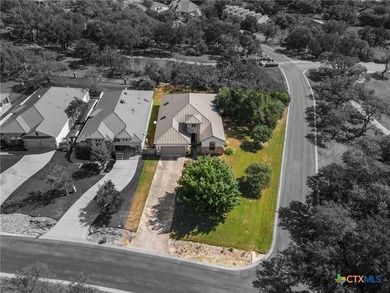 Beautiful home backing to the 17th fairway of Ram Rock Course on Apple Rock Golf Course - Horseshoe Bay in Texas - for sale on GolfHomes.com, golf home, golf lot