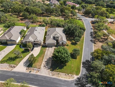Beautiful home backing to the 17th fairway of Ram Rock Course on Apple Rock Golf Course - Horseshoe Bay in Texas - for sale on GolfHomes.com, golf home, golf lot