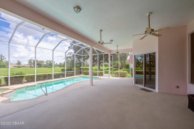 This beautifully maintained 4-bedroom, 3-bathroom pool home on on The Club At Pelican Bay - North Course in Florida - for sale on GolfHomes.com, golf home, golf lot