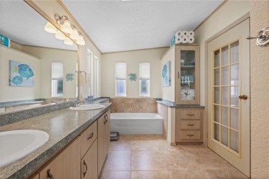 Enjoy the best of Florida living in this turnkey furnished home on Maple Leaf Golf and Country Club in Florida - for sale on GolfHomes.com, golf home, golf lot