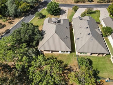 Beautiful home backing to the 17th fairway of Ram Rock Course on Apple Rock Golf Course - Horseshoe Bay in Texas - for sale on GolfHomes.com, golf home, golf lot