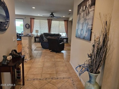 Beautiful Gala Model Sun City Festival home features a Front on Copper Canyon Golf Club in Arizona - for sale on GolfHomes.com, golf home, golf lot