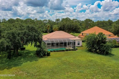 This beautifully maintained 4-bedroom, 3-bathroom pool home on on The Club At Pelican Bay - North Course in Florida - for sale on GolfHomes.com, golf home, golf lot