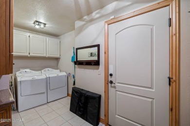 There's plenty of room for the whole family in this home!  This on Pinetop Lakes Golf and Country Club in Arizona - for sale on GolfHomes.com, golf home, golf lot